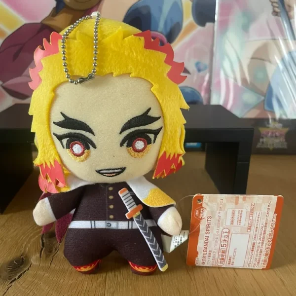 Demon Slayer – Peluche Kyojuro Rengoku Ichiban Kuji (Lot E) 18 cm
