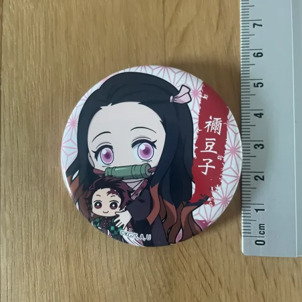Demon Slayer – Nezuko Kamado Gyugyutto Bell House Badge 5 cm